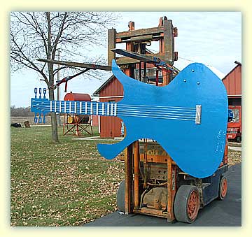 Metal Sculpture Rock and Roll Guitar- Jesse James Theme Park Good Thunder, Minnesota