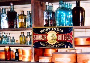  Antique Bottles on Shelf