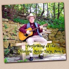 Lonesome Ron at the Betsy-Tacy Bench near the Tacy House - Mankato, Minnesota; Photo by Lona Smith